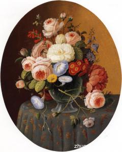 Floral Arrangement in a Glass Vase on a Clothed Table