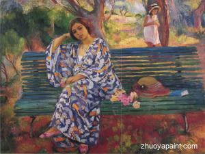 Young woman seated on a bench